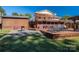 Expansive backyard deck with outdoor seating, grill, and access to upper level balcony and yard at 1501 Fern Forest Dr, Gastonia, NC 28054
