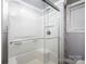 Bathroom featuring white tiled tub and shower combination at 1501 Fern Forest Dr, Gastonia, NC 28054