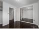Bedroom includes hardwood floors, neutral paint and two closets at 1501 Fern Forest Dr, Gastonia, NC 28054