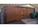 Spacious carport with storage shed and ample space for parking and storage at 1501 Fern Forest Dr, Gastonia, NC 28054
