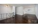 Spacious open-concept living room with hardwood floors and natural light at 1501 Fern Forest Dr, Gastonia, NC 28054
