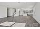Expansive open-concept living space featuring hardwood floors, neutral walls, and abundant natural light at 15015 Meadows Hunt Ln # 164, Huntersville, NC 28078