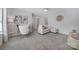 Open loft area with a desk, sofa, and stylish decor at 212 Briana Marie Way, Indian Trail, NC 28079