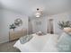 Comfortable main bedroom featuring a dresser and natural light at 212 Briana Marie Way, Indian Trail, NC 28079