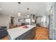 Open concept kitchen with a large kitchen island that opens to the dining and living rooms at 228 Lakeview Dr, Belmont, NC 28012