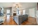 Spacious living room with a brick fireplace, vaulted ceilings, and stylish decor at 285 Fryling Sw Ave, Concord, NC 28025