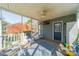 Cozy screened-in porch with ceiling fan and seating area at 285 Fryling Sw Ave, Concord, NC 28025