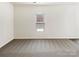 Bedroom with carpet flooring and bright window at 3113 Ellingford Rd, Charlotte, NC 28214