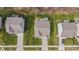 Aerial view showcasing the house, yard, driveway, and surrounding neighborhood at 3114 Woodlands Creek Dr, Monroe, NC 28110