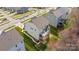 An aerial view of a two-story home with a spacious wooden deck and partially fenced backyard at 3114 Woodlands Creek Dr, Monroe, NC 28110