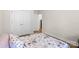 Cozy bedroom featuring two closets, light wood floors, and natural light at 3114 Woodlands Creek Dr, Monroe, NC 28110