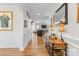 Inviting entryway with hardwood floors leads to the living room and staircase at 3114 Woodlands Creek Dr, Monroe, NC 28110