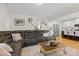 Open-concept living room flows into the kitchen, ideal for entertaining guests at 3114 Woodlands Creek Dr, Monroe, NC 28110