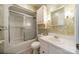 Retro bathroom with wallpaper and a tub/shower combo with glass doors at 4210 Wrangler Sw Dr, Concord, NC 28027