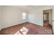 Bedroom with neutral carpet, natural light and closet at 4210 Wrangler Sw Dr, Concord, NC 28027
