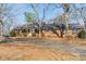 Charming single-story brick home with a well-manicured front lawn at 4210 Wrangler Sw Dr, Concord, NC 28027