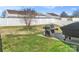 Backyard patio features a grill and a lush lawn at 4716 Meadowfield Rd, Charlotte, NC 28215