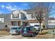 Charming two-story home with brick accents, a welcoming front porch, and a well-maintained driveway at 4716 Meadowfield Rd, Charlotte, NC 28215