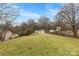 Expansive backyard featuring a hammock, perfect for relaxing and enjoying nature at 590 Main Sw St, Concord, NC 28027