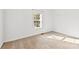 Simple bedroom with carpet flooring and a bright, sunlit window at 590 Main Sw St, Concord, NC 28027