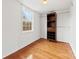 Spacious closet with hardwood floors, built-in shelving and bright natural light at 590 Main Sw St, Concord, NC 28027