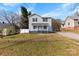 Inviting two-story home with a covered front porch and well-maintained lawn at 590 Main Sw St, Concord, NC 28027
