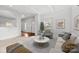 Bright living room featuring neutral tones, recessed lighting, and stylish furniture at 590 Main Sw St, Concord, NC 28027
