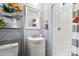 Bathroom featuring a vanity, mirror, shelving, and a stand up shower with sliding door at 7047 Cheyenne Dr, Charlotte, NC 28262