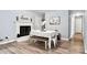 Dining room with a brick fireplace, dining table, and decor at 7047 Cheyenne Dr, Charlotte, NC 28262