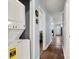 Hallway with washer and dryer, leading to other rooms in the home at 7047 Cheyenne Dr, Charlotte, NC 28262