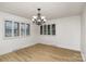 Bright dining room with new floors and lighting at 7407 Forney Hill Rd, Denver, NC 28037