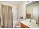 Bathroom features a bathtub with shower, toilet and vanity with neutral color palette at 803 Coach House Ct, Rock Hill, SC 29730