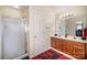Bathroom features a double vanity, enclosed shower and neutral color palette at 803 Coach House Ct, Rock Hill, SC 29730