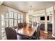 Elegant dining room with a chandelier and plantation shutters at 803 Coach House Ct, Rock Hill, SC 29730