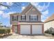 Charming two-story home with a two-car garage and well-maintained landscaping at 803 Coach House Ct, Rock Hill, SC 29730