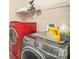 Convenient laundry room with modern washer and dryer and storage space at 803 Coach House Ct, Rock Hill, SC 29730