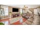 Cozy living room with a fireplace, TV, and hardwood floors at 803 Coach House Ct, Rock Hill, SC 29730