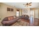 Living room featuring hardwood floors, ceiling fan, and comfortable seating at 803 Coach House Ct, Rock Hill, SC 29730