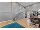 Bright office space featuring a staircase and gym equipment at 8101 Kerrybrook Cir, Charlotte, NC 28214