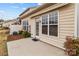 Back patio with sliding glass doors, and a view of the yard at 8412 Brookings Dr, Charlotte, NC 28269