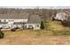 A charming backyard featuring a cozy patio, perfect for outdoor relaxation and entertaining, with a well-maintained lawn at 8412 Brookings Dr, Charlotte, NC 28269