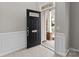 Open entryway with an open door, tile flooring, and neutral wall color at 8412 Brookings Dr, Charlotte, NC 28269