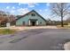 An exterior view of a charming clubhouse, offering a welcoming space for community gatherings and activities at 8412 Brookings Dr, Charlotte, NC 28269