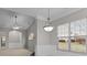 Bright and airy living space featuring recessed lights, large windows, and an open design at 8412 Brookings Dr, Charlotte, NC 28269