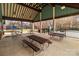 An inviting outdoor pavilion featuring picnic tables, perfect for gatherings and enjoying the surrounding tennis courts at 8412 Brookings Dr, Charlotte, NC 28269