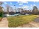 Well-maintained tennis courts surrounded by lush greenery, providing a serene and active recreational space at 8412 Brookings Dr, Charlotte, NC 28269