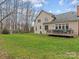Enjoy the spacious backyard with a deck, perfect for outdoor entertaining and relaxation at 9904 Duane Ct, Huntersville, NC 28078