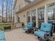 Enjoy outdoor relaxation on this deck with comfortable seating and views of the home's exterior at 9904 Duane Ct, Huntersville, NC 28078