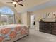 Spacious main bedroom with a large window, carpeted floors, and a view into the ensuite bathroom at 9904 Duane Ct, Huntersville, NC 28078
