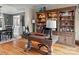 Elegant home office with custom built-ins, hardwood floors, and ample workspace at 9904 Duane Ct, Huntersville, NC 28078